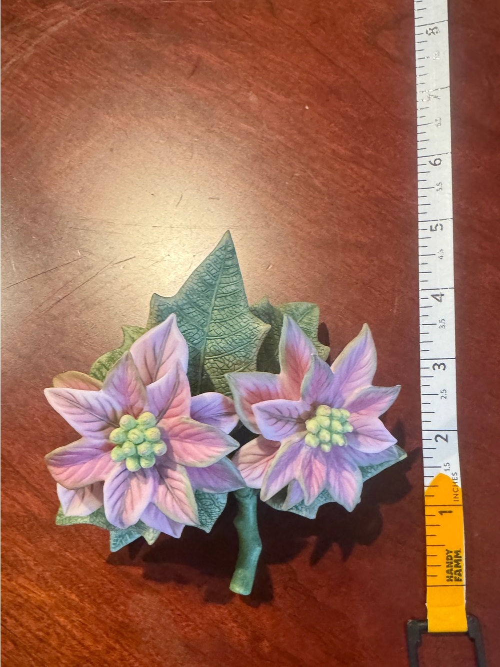 Fine porcelain figurine titled 'Pink Poinsettia' from Lenox Garden Flower Series